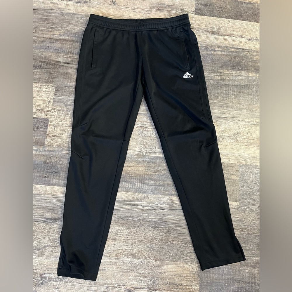 Adidas track pants Womens size Large (fits like a Medium) in Black